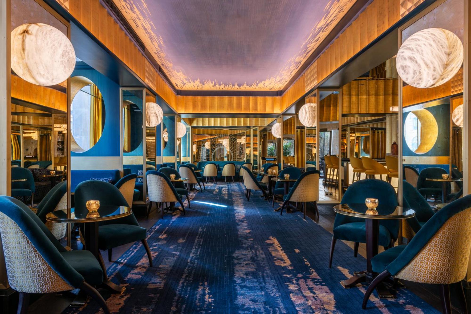 L'Hotel Du Collectionneur Paris Exteriör bild The interior of the restaurant